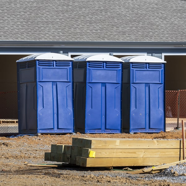 what is the cost difference between standard and deluxe portable restroom rentals in Brookside DE